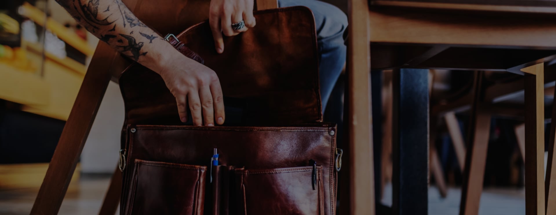 The leather bag you buy once and carry for years.
